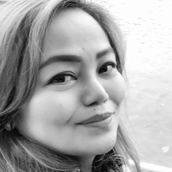 Portrait of Anna Lira Reyes, senior government employee at the National Bureau of Investigation, ensuring legal integrity and operational compliance in NBI Clearance verification.