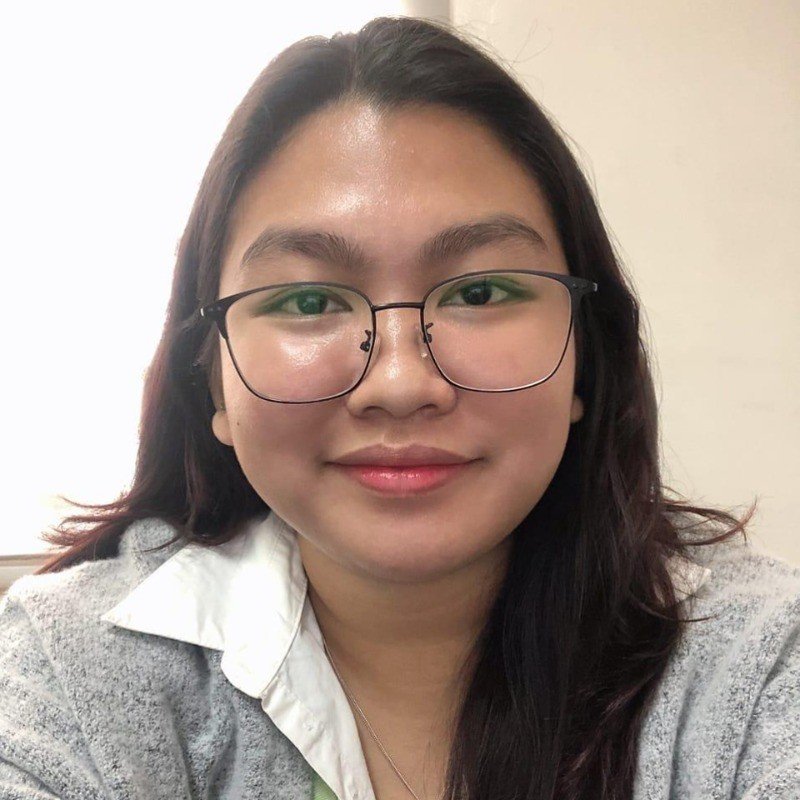 Portrait of Pauline Joy Baylon, Administrative Clerk at the National Bureau of Investigation, ensuring legal compliance and document accuracy for NBI Clearance applicants.